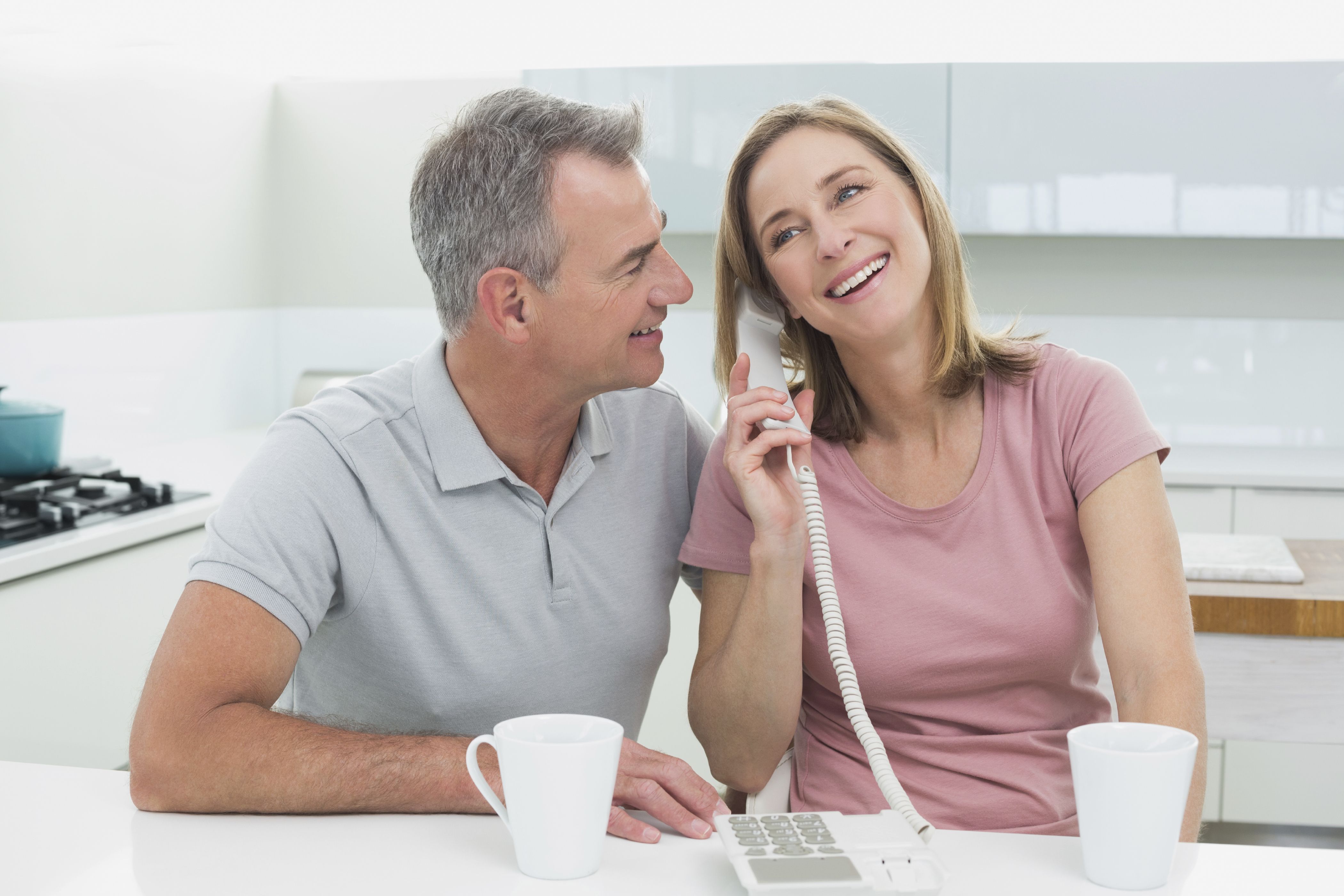 Couple talking on phone